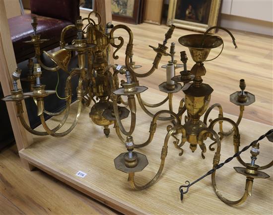 A pair of Dutch style brass chandeliers